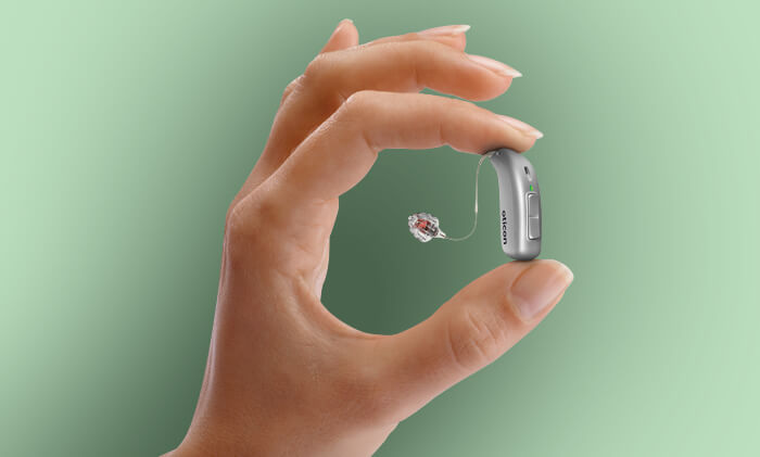 Hand holding a Hearing Aid
