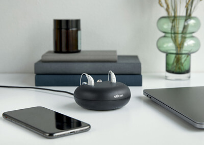 Oticon Hearing Aids in charger
